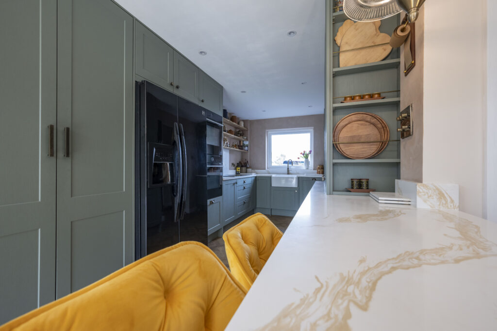Sage green parquet kitchen